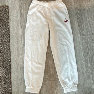 White/ cherry hollister sweats. Size small